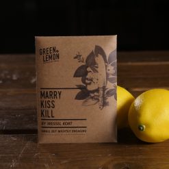 a square cardboard packet beside a lemon
